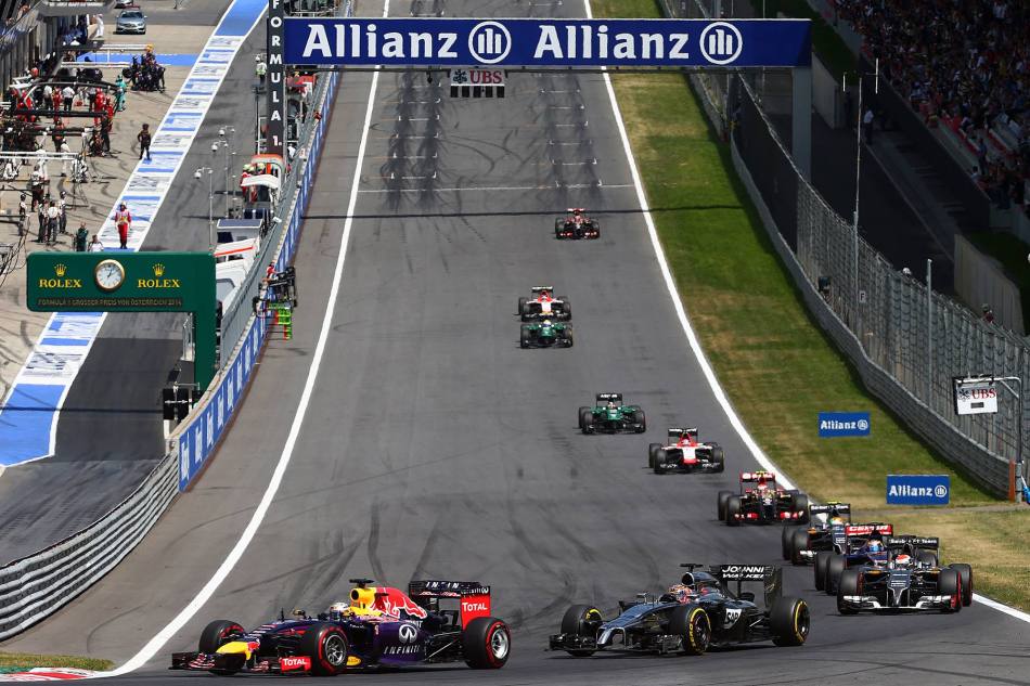 Vettel (Red Bull) et Button (McLaren) au fond du peloton