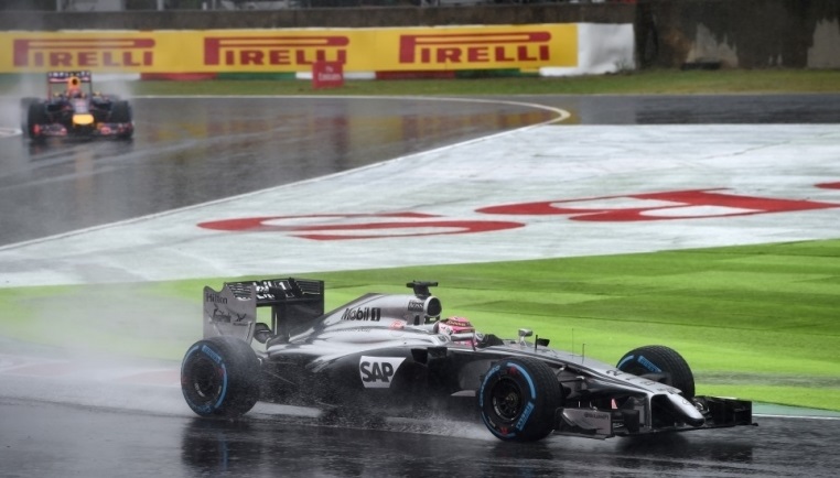 Jenson Button (McLaren) sous la pluie japonaise